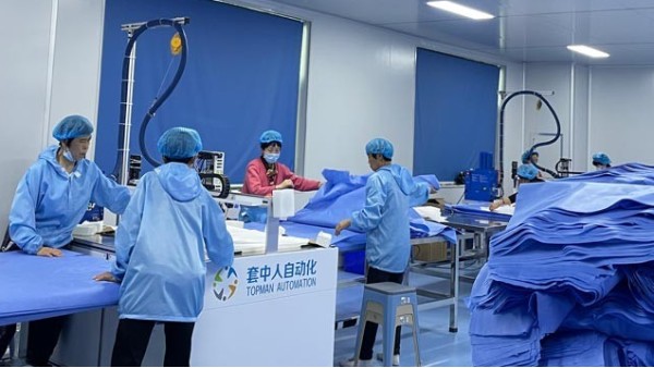 五一套中人自动喷胶机跟手术衣工厂更配